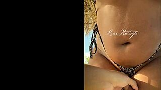 tanned brunette's juicy ass on the beach