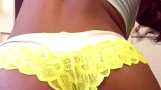 A big pussy strains against little panties while dancing in close-up view