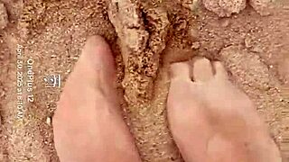 Bare Feet Sensually Play In Sand