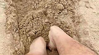 Bare Feet Sensually Play In Sand