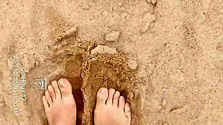 Bare Feet Sensually Play In Sand