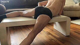 preview of myofascial pressure stretching on table in underwear with percussion massager