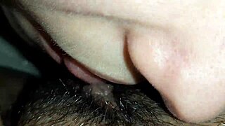 Lesbian couple eats hairy pussy in close-up video