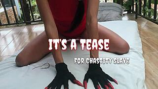 in the pov, teasing the chastity slave's small cock with a sensual handjob