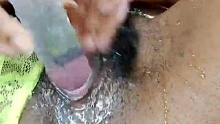 hairy slut jumps on dildo and squirts through her wet pussy