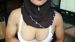 Hey, watch this black hijab transgirl slut stroke until she cums!
