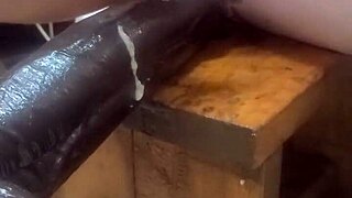 Feeling the huge dildos on the fucking machine for intense anal pleasure.