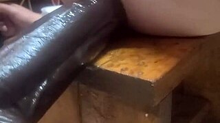 Feeling the huge dildos on the fucking machine for intense anal pleasure.