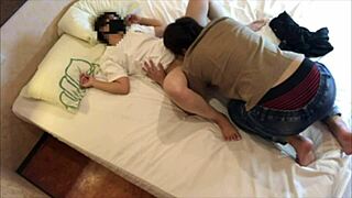 Japanese couple escapes for a steamy hotel afternoon, reliving wild past encounters.