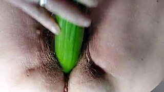 german granny uses dildo and cucumber in hairy pussy