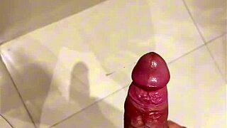 Horny bodybuilder in shower with big cock action!