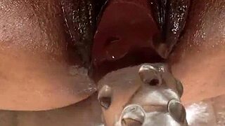 Big pussy insertion with huge dildo and clit play
