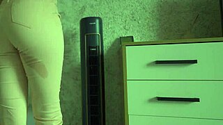 Female Desperately Pees In Jeans At Home