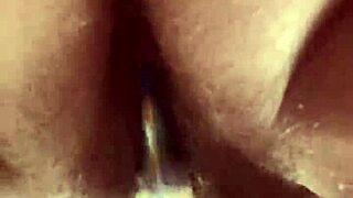 Curvy woman masturbates hairy pussy with glass dildo close up