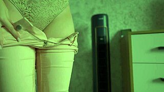 Female Desperately Pees In Jeans At Home