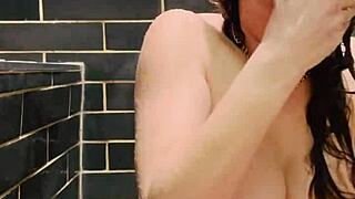 i cum in the shower while masturbating my big tits, love being watched.