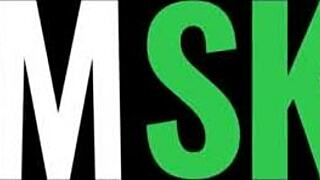 Flexible brunette performs a sexy routine with flashing