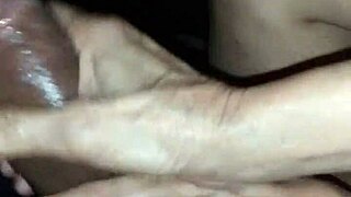 Amazing Asian Babe Gives Oiled Handjob To Huge Black Cock!