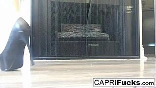 Capri in high heels masturbates her big tits?