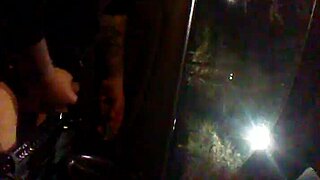 Alone in the car, jerking off cock outdoors for public masturbation thrill.