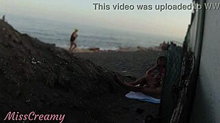 Flashing my cock at the public beach, my stepdaughter helps me cum in front of everyone