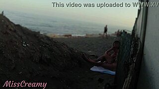 Flashing my cock at the public beach, my stepdaughter helps me cum in front of everyone