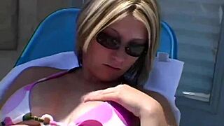 Paige oljer opp seg utendørs i sola