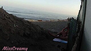 Flashing my cock at the public beach, my stepdaughter helps me cum in front of everyone