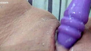 she says, 'watch me wet this toy and play with my pussy'