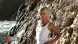 Blonde Nicky Wayne Undresses by the Sea