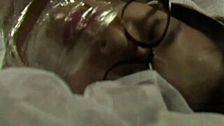 Nerd girl strips off and straps herself for hardcore bondage