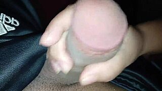 She admires her boyfriend's cum during handjob