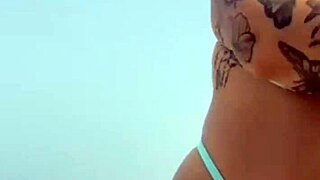 Young African Babe Meets Muscular Guy On Beach, Applies Sunscreen Boldly