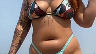 Young African Babe Meets Muscular Guy On Beach, Applies Sunscreen Boldly