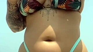 Young African Babe Meets Muscular Guy On Beach, Applies Sunscreen Boldly