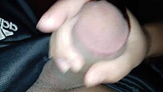 She admires her boyfriend's cum during handjob