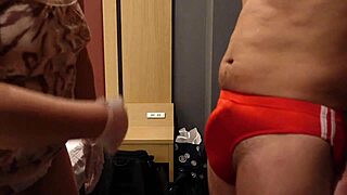 femdom bitch slaps erect cock over tight bloomers and kicks balls