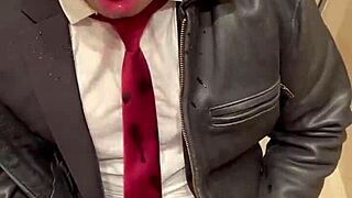 Men in leather costumes play kinky at office