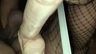 Can you believe this big pussy swallowing a massive 14 inch dildo?
