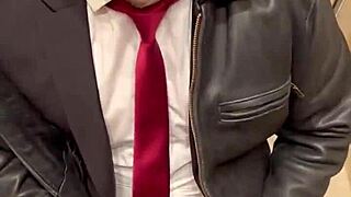 Men in leather costumes play kinky at office