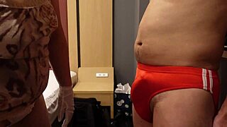 femdom bitch slaps erect cock over tight bloomers and kicks balls