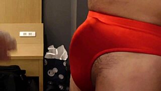 femdom bitch slaps erect cock over tight bloomers and kicks balls