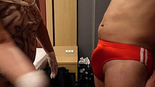 femdom bitch slaps erect cock over tight bloomers and kicks balls