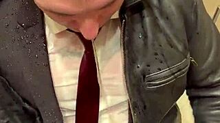 Men in leather costumes play kinky at office