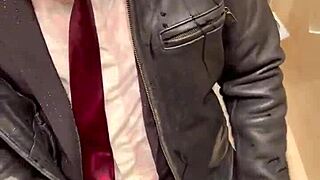 Men in leather costumes play kinky at office