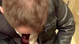 Men in leather costumes play kinky at office