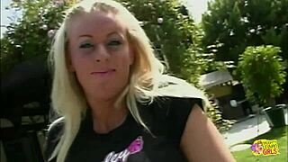 blonde lesbian uses strapon in doggystyle position