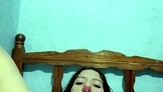 I'm in the bedroom, touching myself with my natural tits until I cum hard.