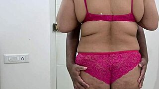 see this ebony girl in bikini giving a handjob? her huge tits bounce!