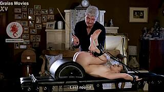 Master targets sensitive pussy while caning her